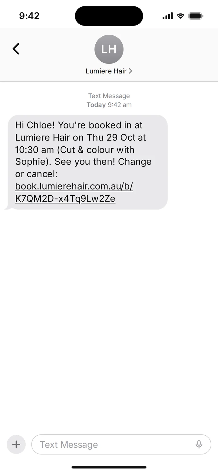 The text the client gets a minute later: Hi Chloe, you’re booked in at Lumiere Hair on Thursday 29 October at 10:30 am, with a link to change or cancel